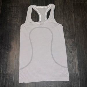 Lululemon black and white striped tank top. Size 4.